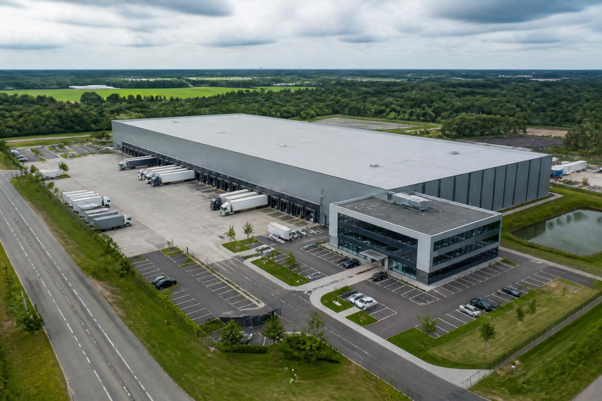 Aerial view of a distribution site with warehousing and offices